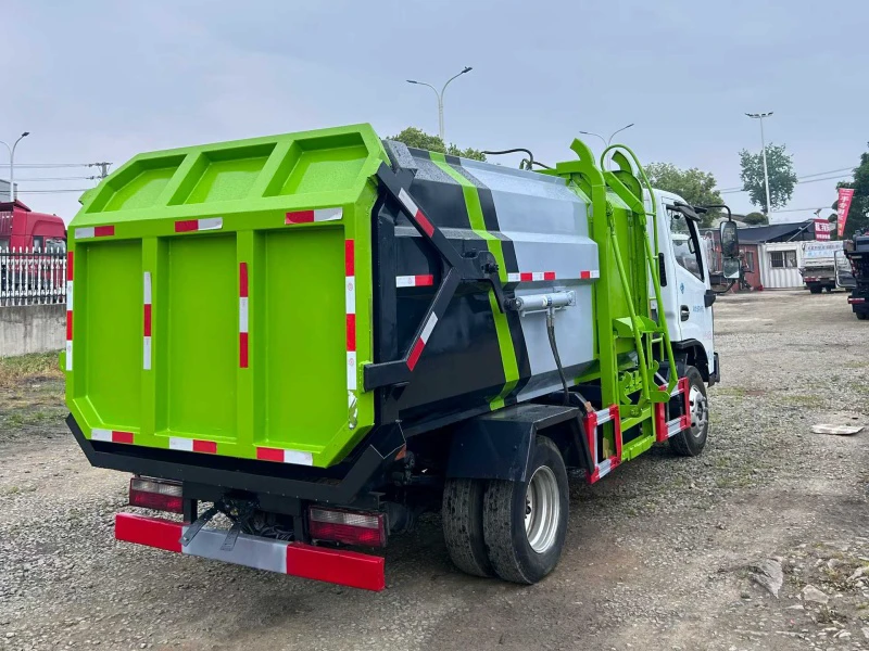 Used Dongfeng 4×2 Side-Loading Compactor Garbage Truck 05 Used Dongfeng 4×2 Side-Loading Compactor Garbage Truck 05